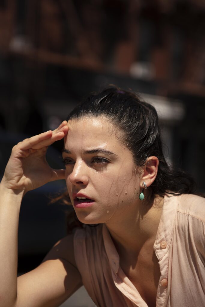Woman experiencing hot flashes